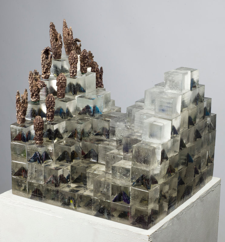 LK Arts resin and bronze sculptural lighting